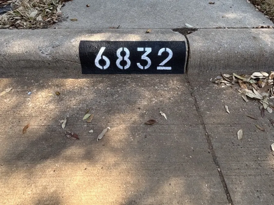 Classic black and white curb address numbers