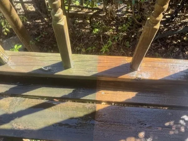 Deck railing section, half cleaned to show the difference