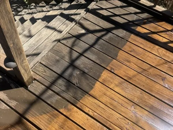 Deck surface, half cleaned to show the difference