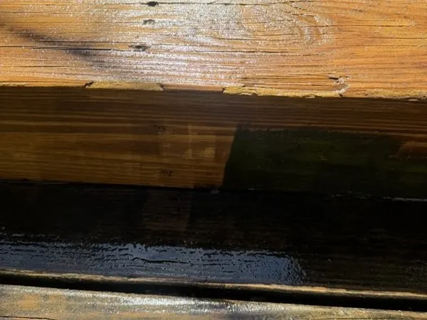 Deck step edge, half cleaned to show the difference