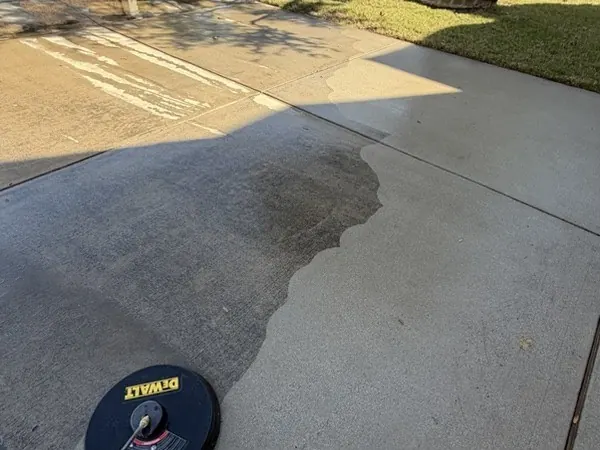 Driveway, one pass at a time, half cleaned to show the difference