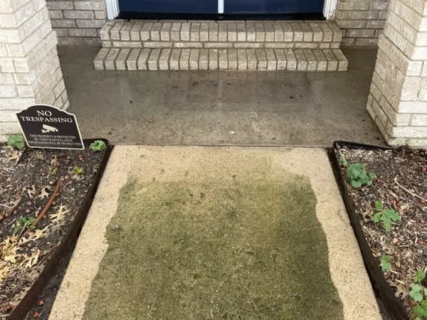 Entry walk mid-clean, half cleaned to show the difference