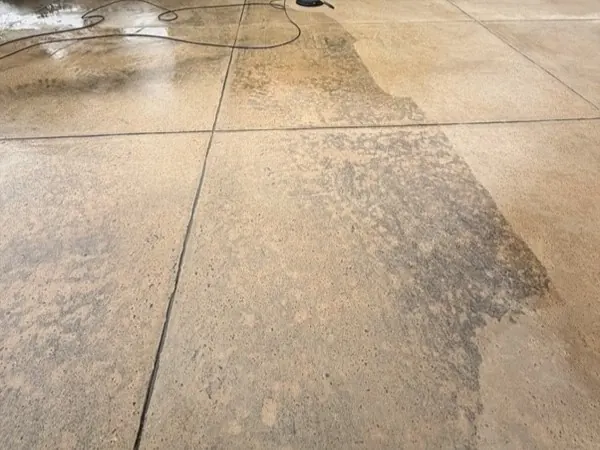 Patio mid-clean, half cleaned to show the difference