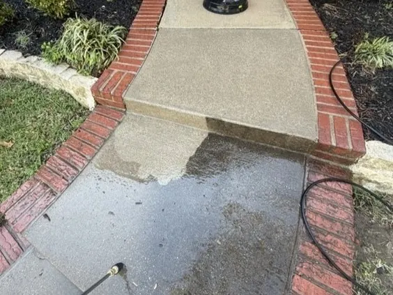 Walkway mid-clean, half cleaned to show the difference