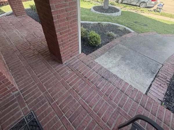 Brick porch, before cleaning