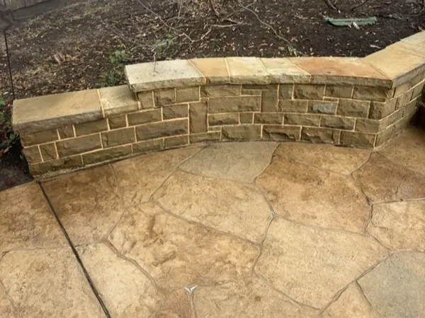 Stone retaining wall, after cleaning