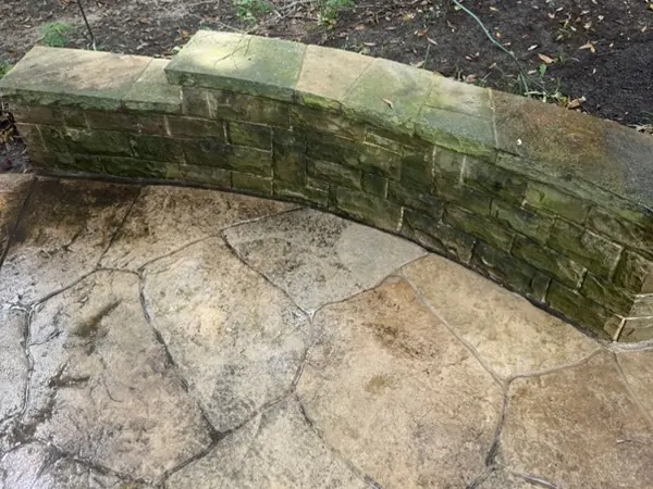 Stone retaining wall, before cleaning